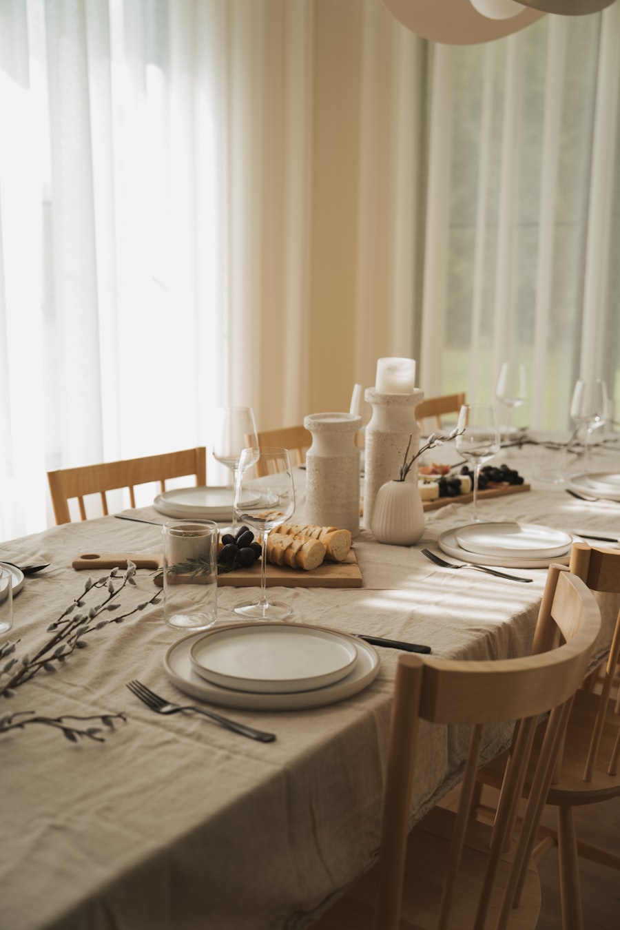 Elegant dinnerware and serving set laid out on a table